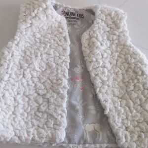 Fuzzy Cream Genuine Kids Vest with woodland lining